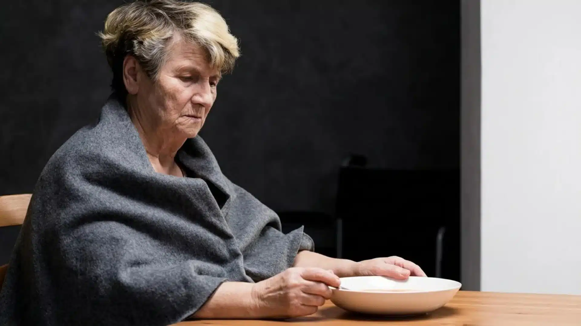 elderly-woman-sitting-in-depression