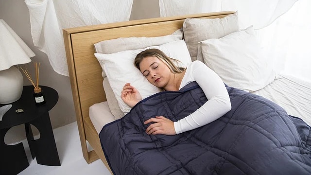 women sleeping in blanket