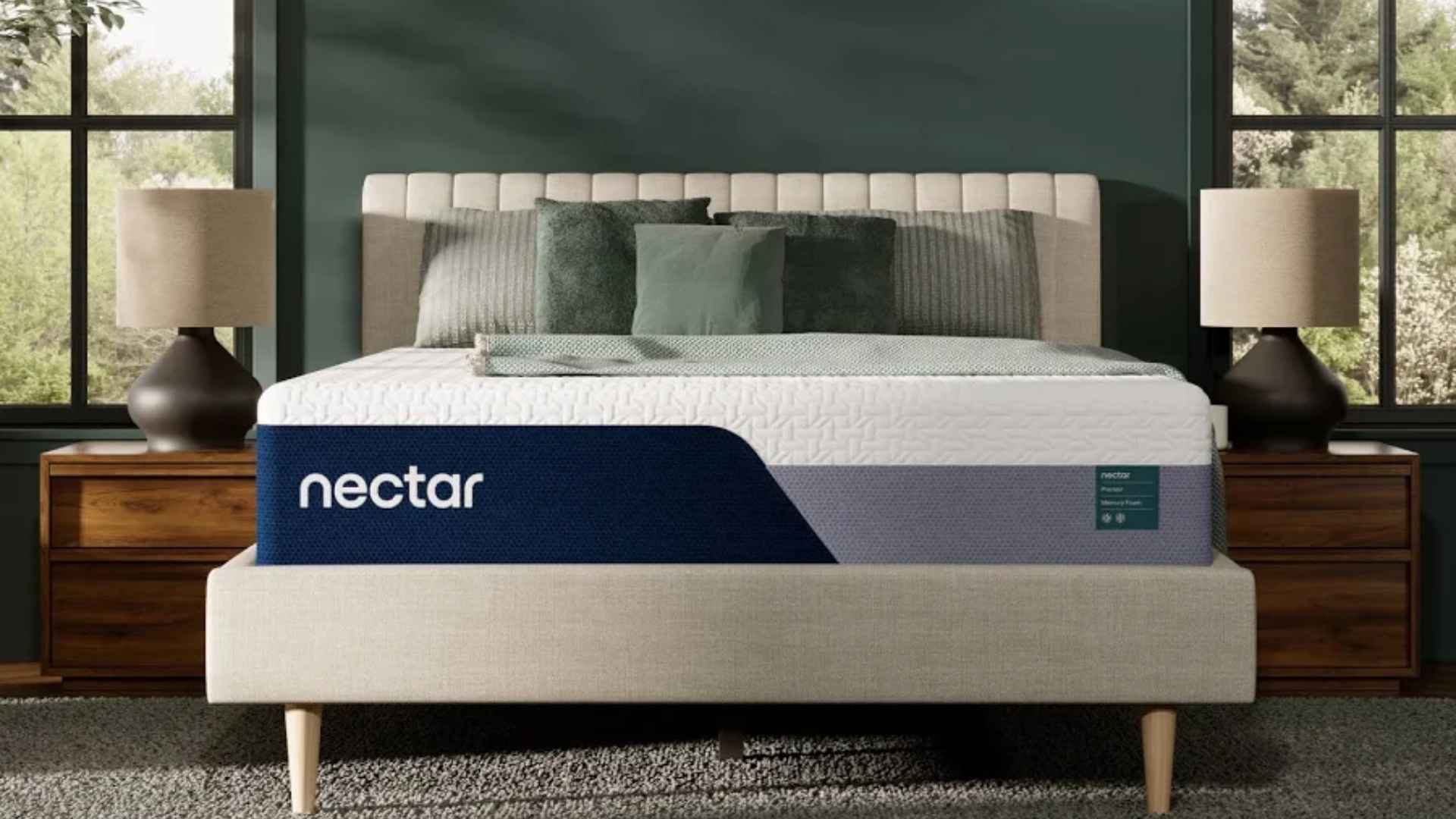 Nectar Premier memory foam mattress on upholstered bed frame with dark accent wall and modern decor.